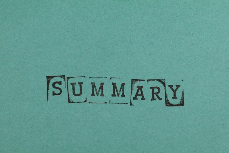 a close up of a piece of paper with the word'summary '.