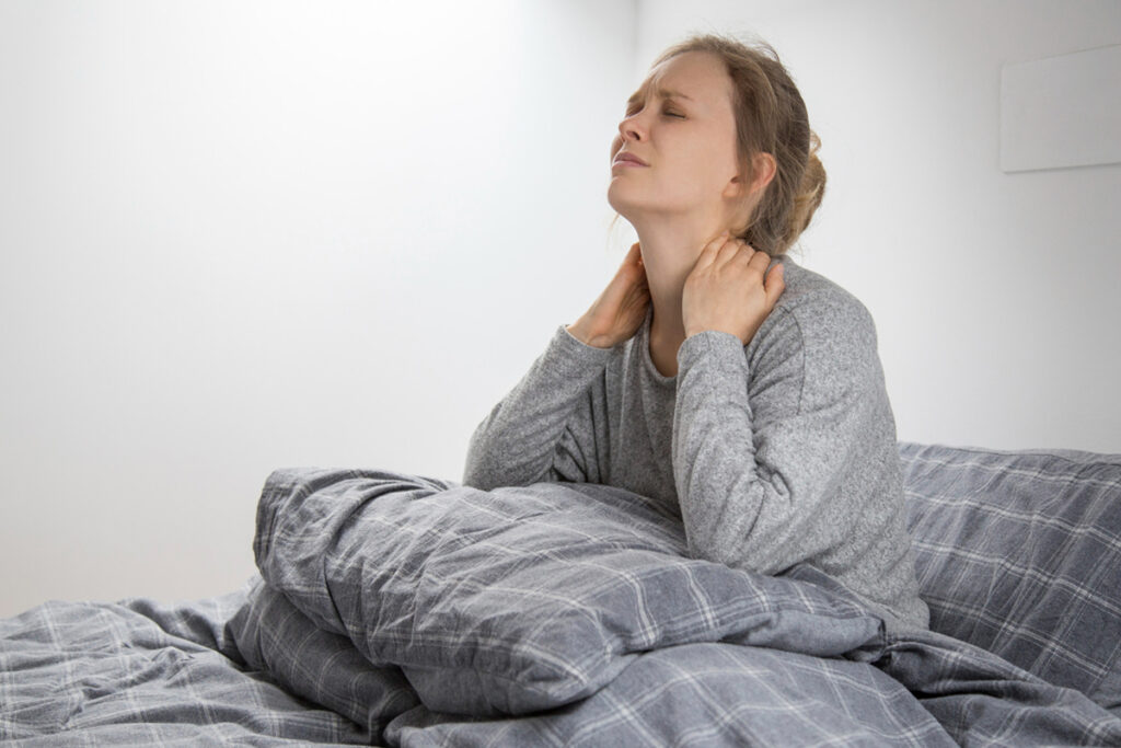 Why Does My Neck Hurt When I Wake Up? Causes & Fixes
